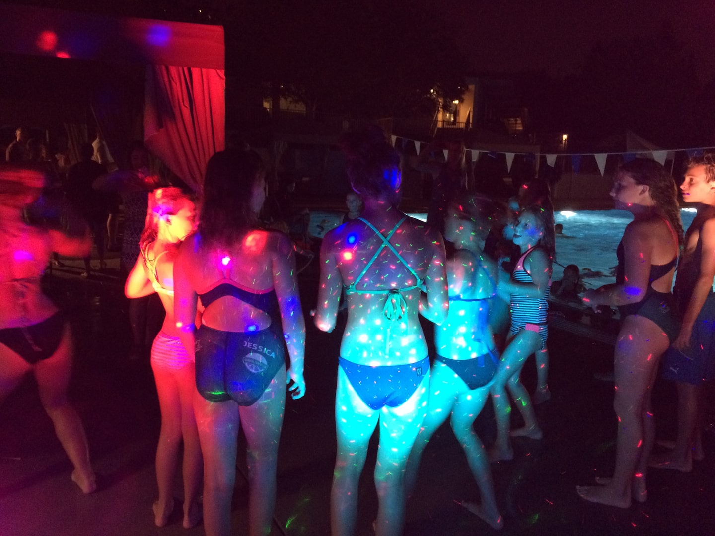 Group of girl standing near the pool